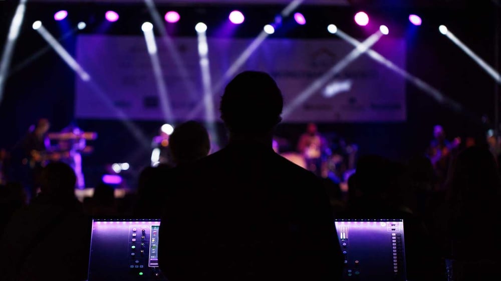 silhouette of technician at live event